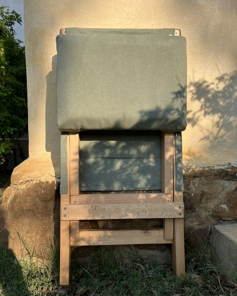 Beech folding chair folded flat